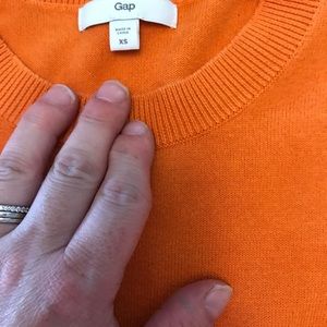 Orange quarter length sweater